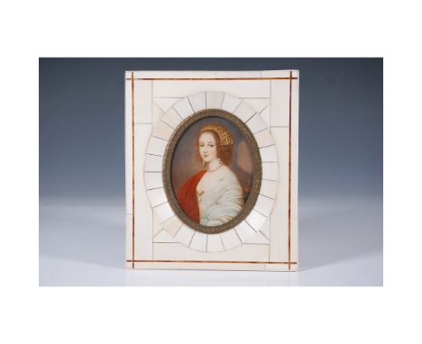 A finely crafted miniature portrait of a noblewoman, displayed in an intricately inlaid ivory frame. The portrait captures a 