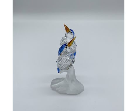 This Swarovski crystal figurine features Malachite Kingfishers, part of the esteemed Feathered Beauties collection. Known for