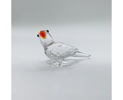 This Swarovski crystal parrot, code numbers 294 047 / 294047 / 7621 000 009, is a retired piece from the Feathered Beauties c