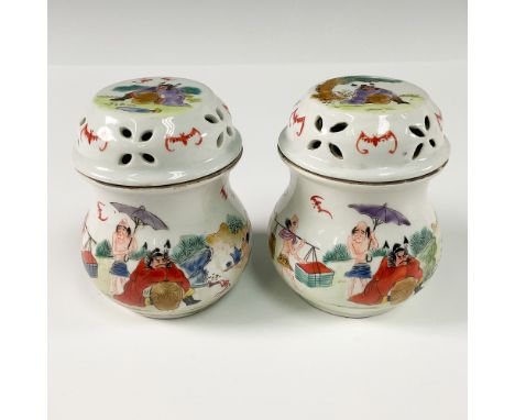 A finely crafted pair of vintage Chinese porcelain incense burners, beautifully hand painted with intricate scenes depicting 