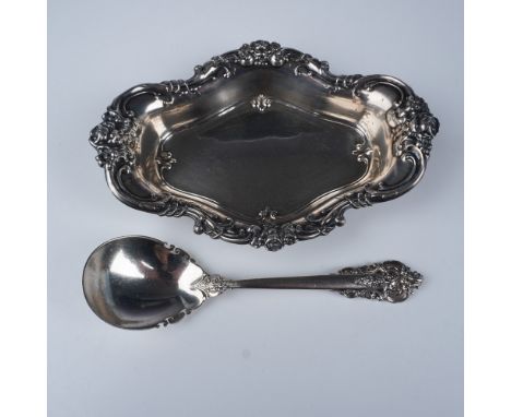 Featuring a beautifully crafted nut bowl and spoon. The nut bowl, marked "Wallace Sterling 41214," showcases an ornate floral