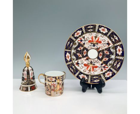 A stunning three-piece Royal Crown Derby porcelain set featuring the iconic Imari pattern with intricate floral and geometric