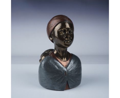 A striking bronze figural bust by renowned Zimbabwean sculptor Casper Darare, depicting a woman wearing a headscarf with a sl