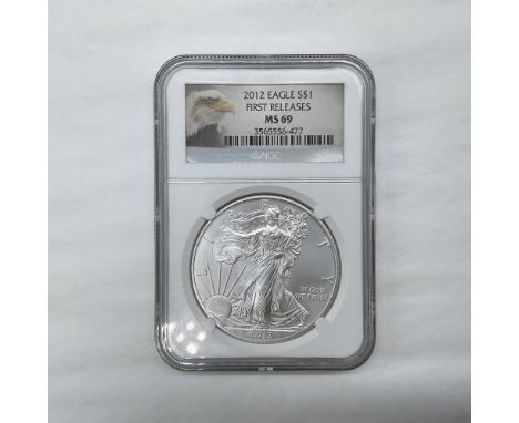 NGC Slabbed First Releases. The obverse side features full length of Liberty in stride. She is shown wrapped in the folds of 