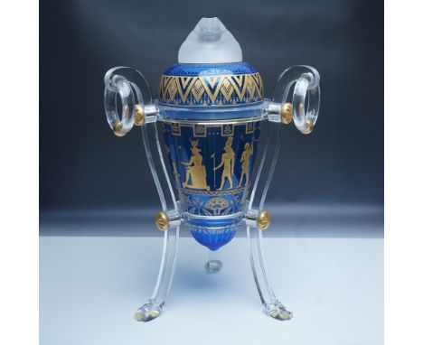 An extraordinary limited edition Baccarat Egyptian Revival crystal vase shaped as a canopic jar. Featuring intricate gilded a