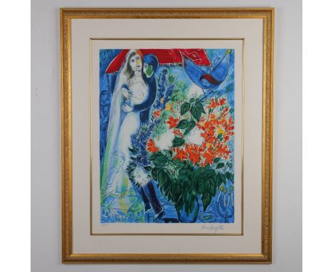 Housed in a gilt frame with a white mat. A lithograph of Chagall's 1949 painting of a bride and groom. Signed in plate lower 