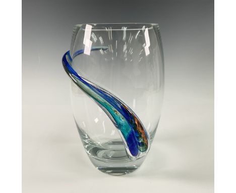 This unique art glass vase showcases a contemporary oval-shaped body with a striking design. The vase features a clear glass 