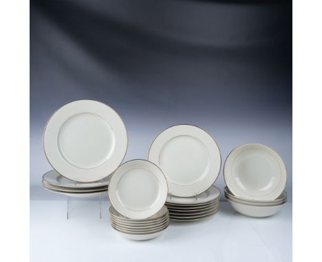 This stunning 24-piece dinnerware set from Ivory Elegance, featuring the Dynasty pattern by Ranmaru, was crafted in Japan and