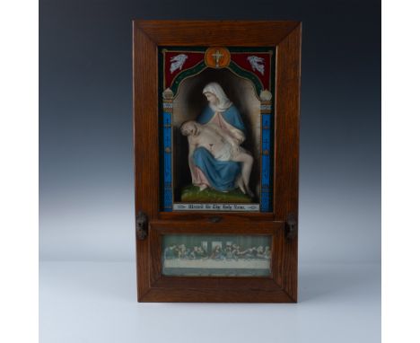 This beautifully crafted antique shadow box features two striking religious depictions: the Pieta and The Last Supper. Encase