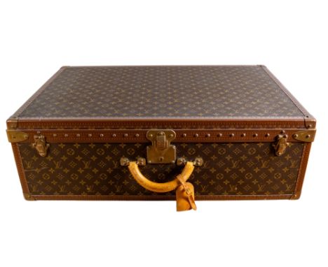 Louis Vuitton Circa 1980 A monogram canvas 80L trunk With brass fittings&nbsp;  Dimensions:&nbsp; 10 in. (H) x 31.5 in. (W) 