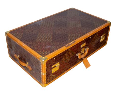 Italian Escada 20th Century A leather trunk on wheels  Dimensions: 35 in. (H) x 21 in. (W) 