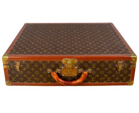 Louis Vuitton Circa 1980 A monogram canvas 65L trunk With brass fittings&nbsp;  Dimensions:&nbsp; 7 in. (H) x 26 in. (W) 