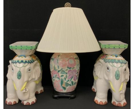 A pair of Oriental ceramic elephant stools, 43cm high;  a chinoiserie table lamp, 73cm high, (3).