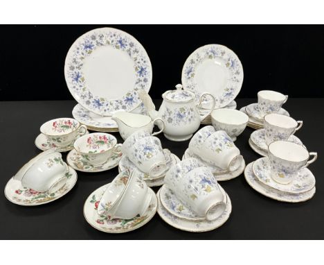 Colclough Rhapsody in Blue tea service for six comprised of; a tea pot, milk jug, sugar bowl, four dinner plates, eight lunch