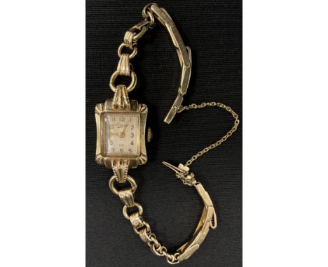 A lady's Everite 9ct gold cased bracelet wristwatch, shaped inverted case, rectangular dial, Arabic numerals, manual wind mov