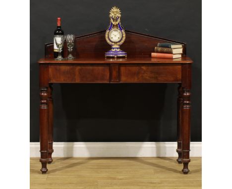 A William IV mahogany pier or side table, pointed arched back centred by a draught-turned roundel, moulded top above a pair o