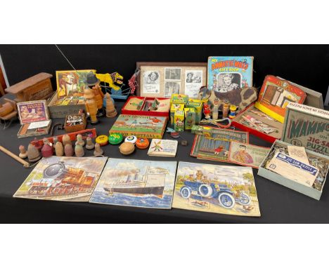 Toys - Mule puppet, Annette milis gift book, wooden pull along van; dog chasing space man toy, Jigsaw puzzles, spinning tops,