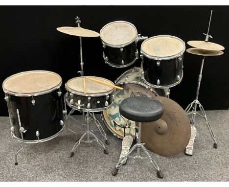Musical instruments - a drum kit - eight piece set including snare drum, floor Tom, kick floor Tom, cymbals, etc, and an adju
