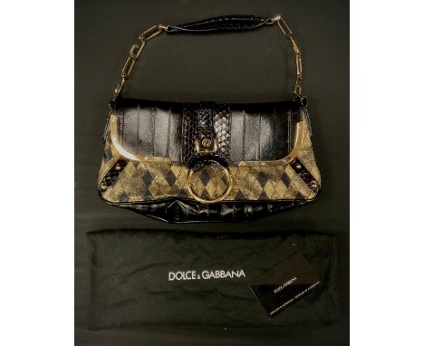 A Dolce &amp; Gabbana black leather and gold fabric handbag, interconnected D &amp; G letter strap, loop front drop buckle, t
