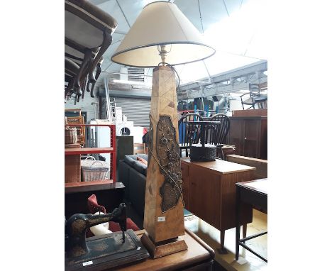 A modern lamp formed as an obelisk 