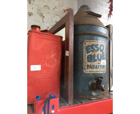 An Esso Blue paraffin can, a jerry can and a mirror 