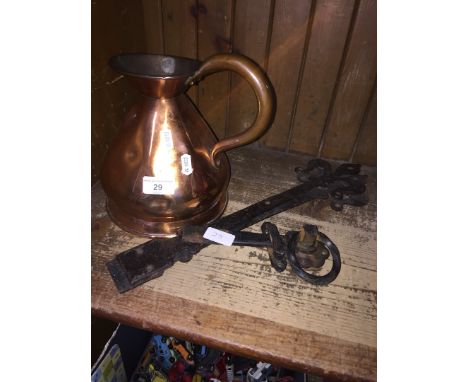 A copper jug, pair of door hinges and a door knocker 