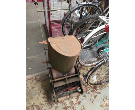 A vintage push lawn mower 