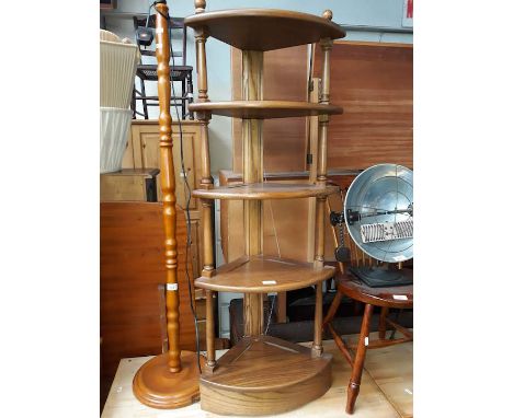 An Ercol open corner shelving rack 