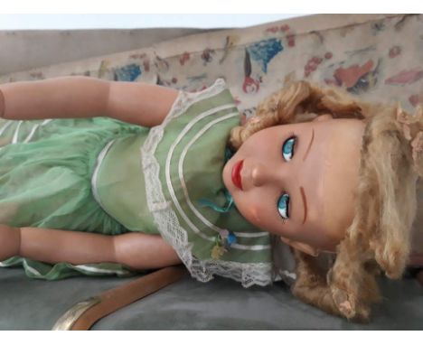 A large vintage doll with original box 