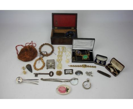 A Lady's 9ct gold wrist watch, in case; with a Moorcroft Magnolia pattern pin dish, a plated pocket watch, cuff links, skull 