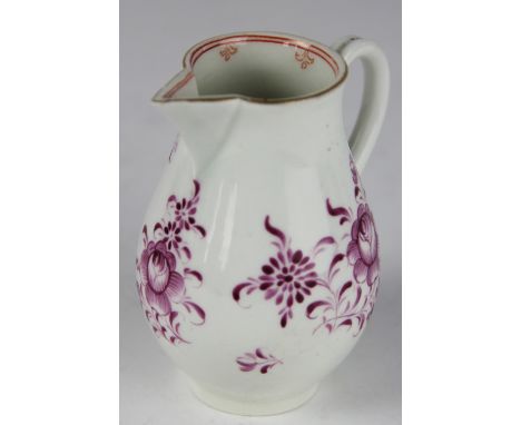 An 18th century Worcester porcelain sparrow beak jug, painted with puce floral sprays, 9cm