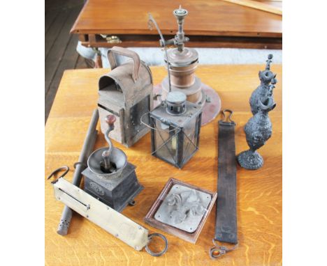 A cast iron and brass coffee grinder, with patent badge; a lamp, a lantern; a thermometer; a leather strop; a copper and enam