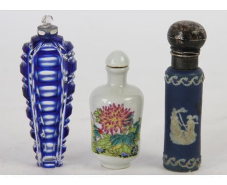 A blue jasper cameo ware cylindrical scent bottle by BP Co, England, with silver cover and mount (at fault) 9cm high; with a 