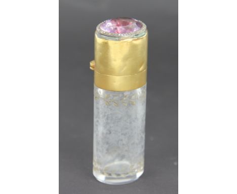 An amethyst and diamond set scent bottle, 19th century, the colourless glass bottle with engraved foliage, with gold cover (u