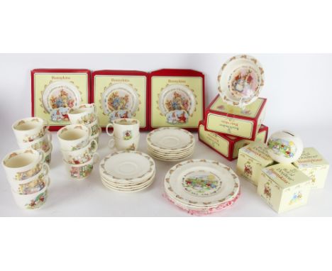 A collection of Royal Doulton Bunnykins, comprising three 'New Arrival' baby bowls, fourteen tea cups and twelve saucers, fiv