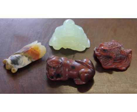 Two carved boxwood netsuke, to include; a toad 4.5cm wide and a monkey 5.5cm wide, both with mother of pearl inset signature,