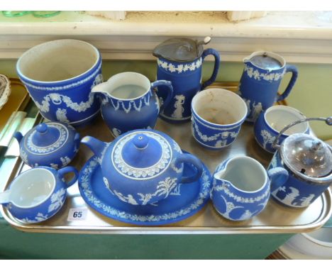 Wedgwood dark blue jasper ware teapot, jugs, plant pots, etc. 
