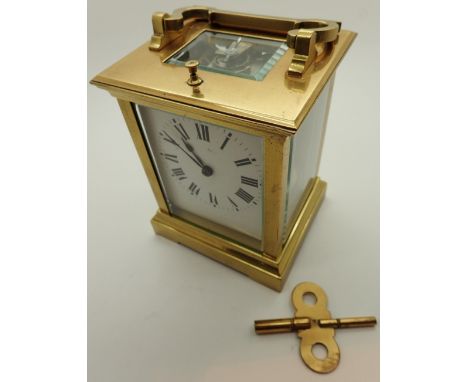 Brass key wind repeater carriage clock H: 12 cm CONDITION REPORT: This item is working at lotting.