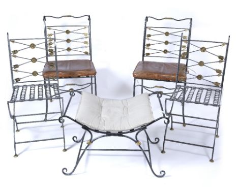 A PAIR OF WROUGHT IRON SIDE CHAIRS with crossed arrow decorated backs and seats with squab cushions, 50cm wide x 93cm high to