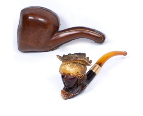 A VICTORIAN MEERSCHAUM PIPE carved in the form of a young lady wearing a bonnet, with gold collar and amber thumb piece, 15cm