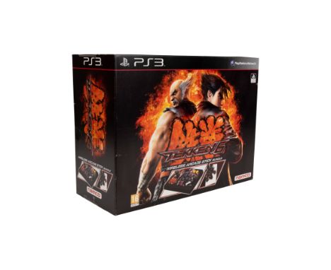 This lot features the Tekken 6 Wireless Arcade Stick Bundle complete in box and brand new. It includes a steel book edition o