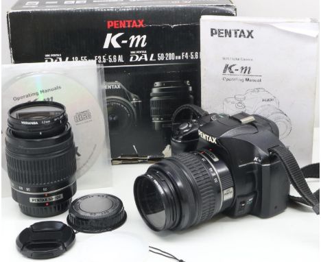 Pentax Km digital camera 10 mp, with two lenses, boxed. UK P&amp;P Group 2 (£20+VAT for the first lot and £4+VAT for subseque