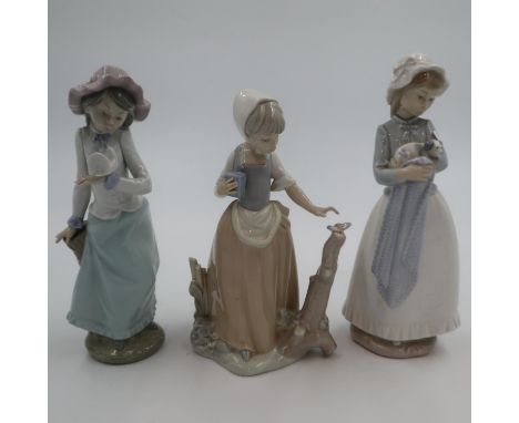 Three Nao figurines, tallest 25cm, no cracks or chips. UK P&amp;P Group 3 (£30+VAT for the first lot and £8+VAT for subsequen