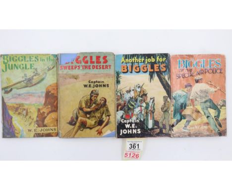Four Biggles hardback books by Captain W.E Johns with dust covers. UK P&amp;P Group 2 (£20+VAT for the first lot and £4+VAT f