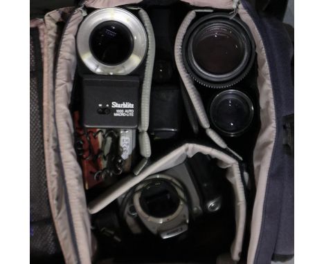 Case of Canon camera lenses, light meter and a flash gun. UK P&amp;P Group 3 (£30+VAT for the first lot and £8+VAT for subseq