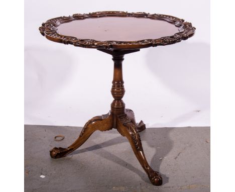 Mahogany circular pedestal table, with carved edge, turned birdcage column,carved tripod supports, 77cm diameter, height 72cm