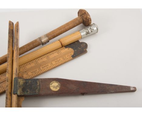 Equine interest, a 75cm woven leather whip with similar pommel, silver buckle design mount hallmarked Chester 1899, a 56cm ba
