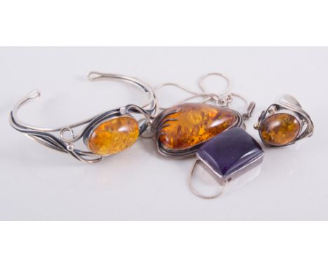 A Baltic Amber bangle, ring, pendant stamped 925, other costume jewellery.