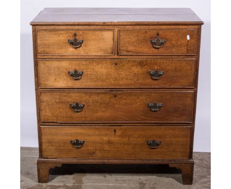 A Victorian oak chest of drawers, cross-banded top, fitted with two short and three long drawers, bracket feet, woodwormed, w