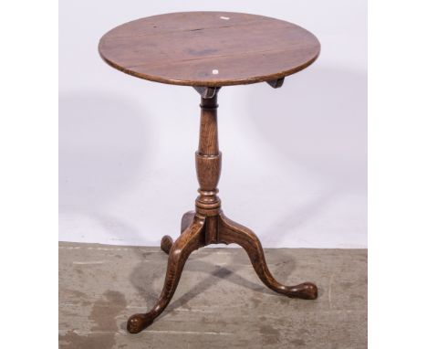 A George III oak pedestal table, circular tilt top, baluster column, tripod legs, adapted, diameter 52cm.